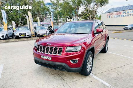 Red 2014 Jeep Grand Cherokee SUV LAREDO