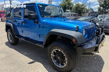 Blue 2015 Jeep Wrangler Unlimited Softtop Sport (4X4)