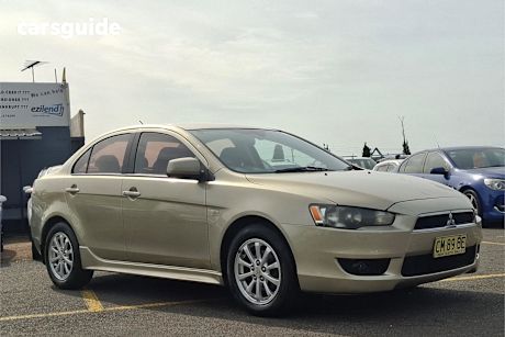 Gold 2009 Mitsubishi Lancer Sedan Vr