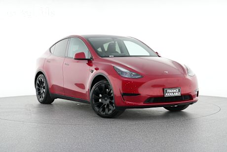 Red 2023 Tesla Model Y Wagon Rear-Wheel Drive