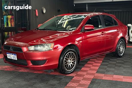 Red 2009 Mitsubishi Lancer Sedan Es