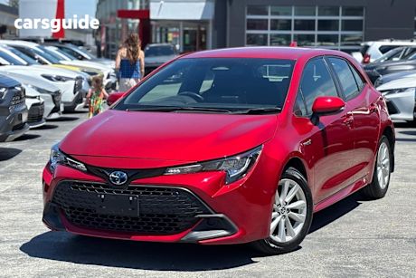 Red 2022 Toyota Corolla Hatchback Ascent Sport Hybrid