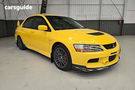 Yellow 2006 Mitsubishi Lancer Sedan Evolution Ix