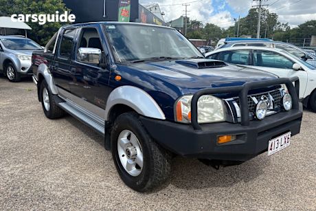 Blue 2009 Nissan Navara Dual Cab Pick-up St-R (4X4)