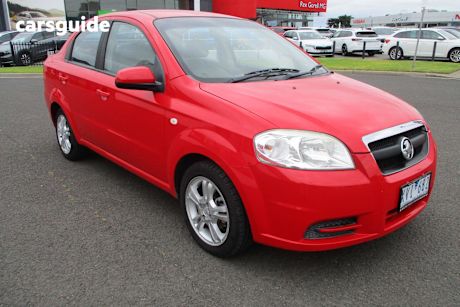 Red 2010 Holden Barina Sedan