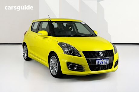Yellow 2015 Suzuki Swift Hatchback Sport