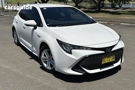 White 2021 Toyota Corolla Hatchback Ascent Sport Hybrid