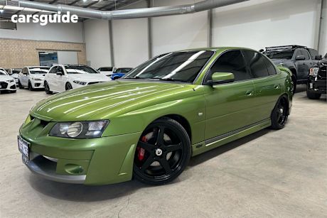 Green 2002 HSV Clubsport Sedan R8