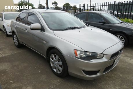 Gold 2012 Mitsubishi Lancer Sedan Es