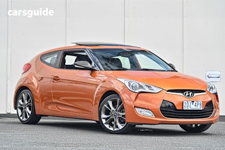 Orange 2011 Hyundai Veloster Hatch + F
