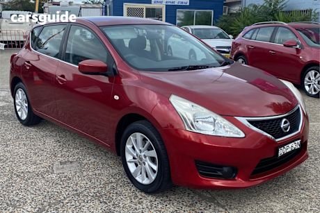 Red 2014 Nissan Pulsar Hatchback St