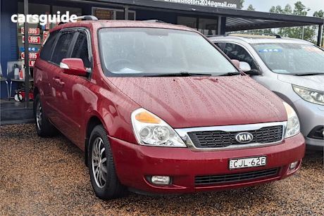Red 2012 Kia Grand Carnival Wagon Sli