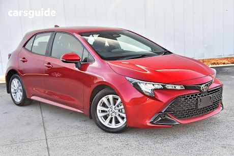 Red 2024 Toyota Corolla Hatchback Ascent Sport