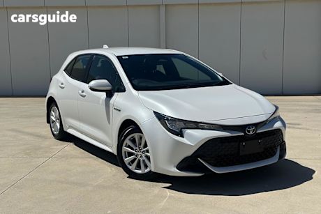 White 2023 Toyota Corolla Hatchback Ascent Sport Hybrid
