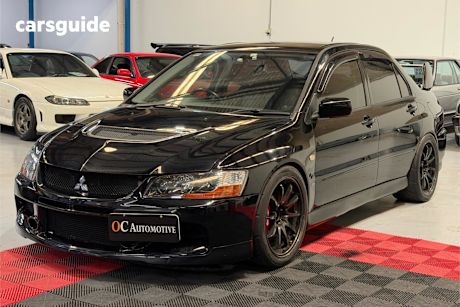Black 2006 Mitsubishi Lancer Sedan Evolution Ix