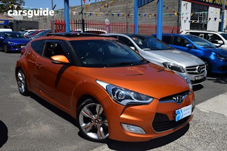 Orange 2014 Hyundai Veloster Coupe +