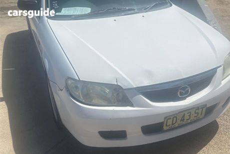 White 2003 Mazda 323 Hatchback Astina Shades