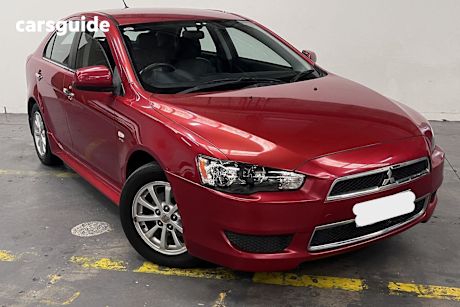 Red 2012 Mitsubishi Lancer Sedan Lx