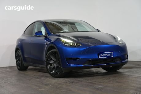 Blue 2023 Tesla Model Y Wagon Rear-Wheel Drive