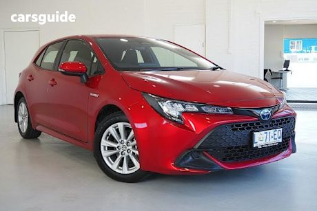 Red 2023 Toyota Corolla Hatchback Ascent Sport Hybrid