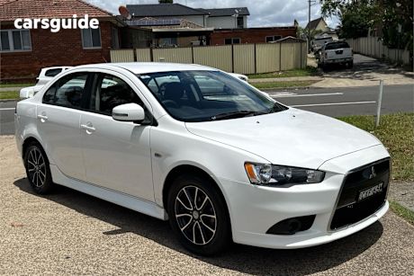White 2014 Mitsubishi Lancer Sedan Es Sport