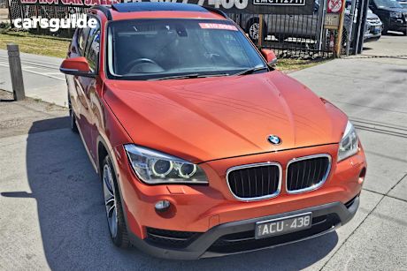 Orange 2013 BMW X1 Wagon Sdrive 18D Xline