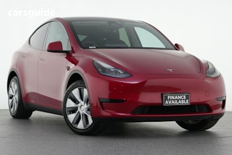 Red 2023 Tesla Model Y Wagon Rear-Wheel Drive