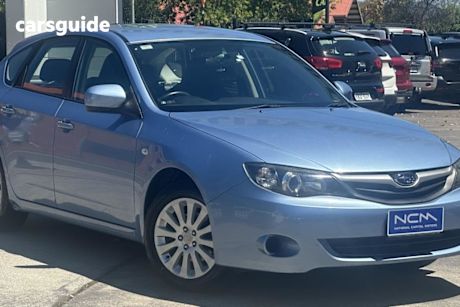 Blue 2011 Subaru Impreza Hatchback R (Awd)