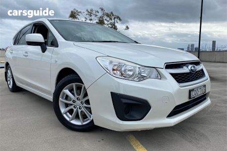 White 2013 Subaru Impreza Hatchback 2.0I (Awd)