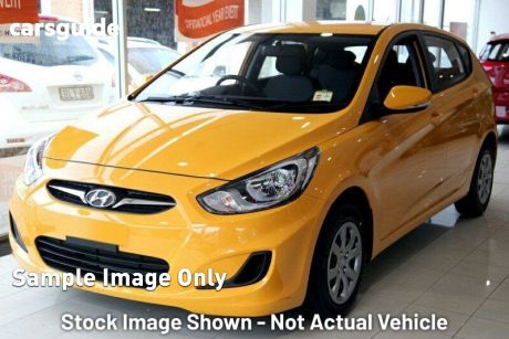 Yellow 2014 Hyundai Accent Hatchback Active