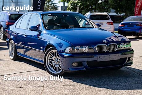 Blue 2011 BMW M5 Sedan