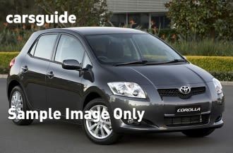 Red 2009 Toyota Corolla Hatchback Conquest