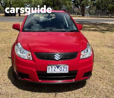 Red 2011 Suzuki SX4 Hatchback AWD