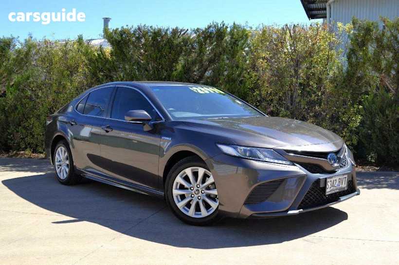 Brown 2019 Toyota Camry Sedan Ascent Sport (hybrid)