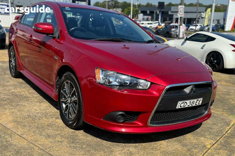 Red 2014 Mitsubishi Lancer Sedan ES Sport