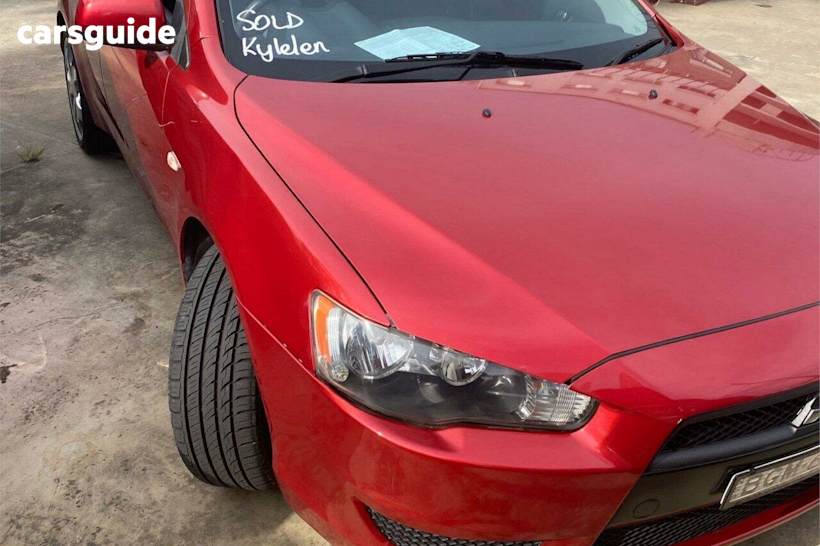 Red 2008 Mitsubishi Lancer Sedan ES