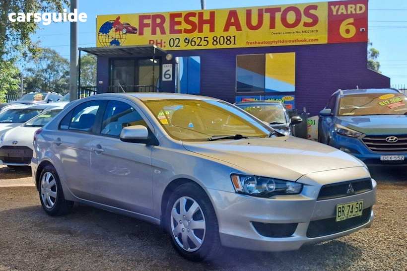 Silver 2012 Mitsubishi Lancer Sedan ES