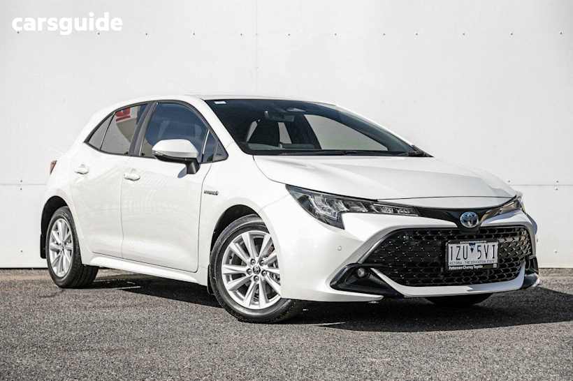 White 2023 Toyota Corolla Hatchback SX Hybrid