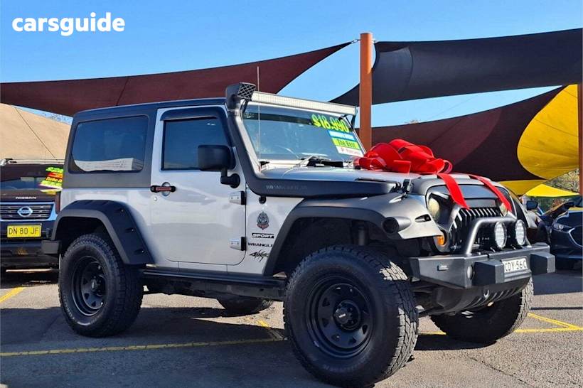 Silver 2011 Jeep Wrangler Hardtop Renegade Sport (4X4)