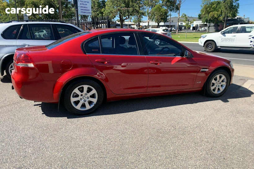Red 2010 Holden Commodore Sedan Omega