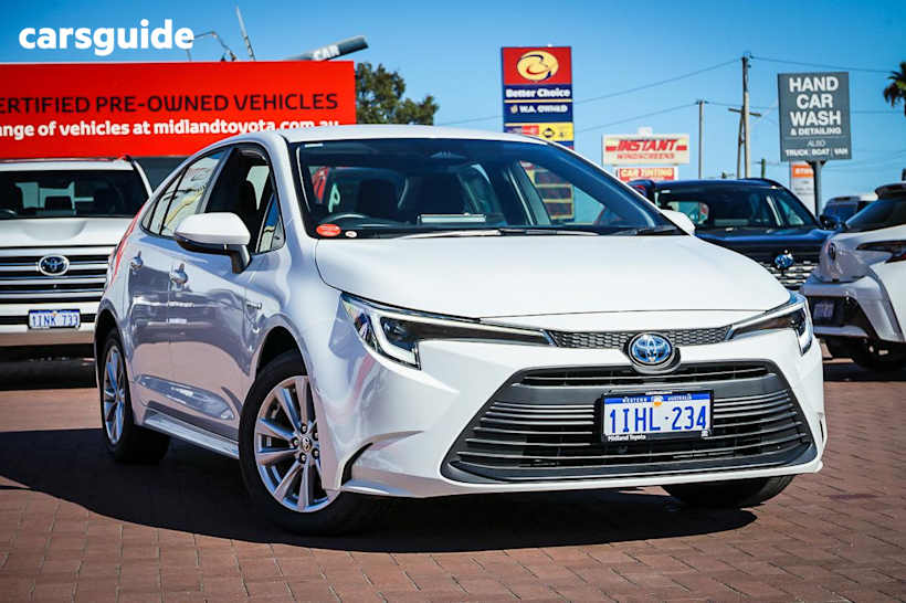 White 2024 Toyota Corolla Sedan Ascent Sport HEV