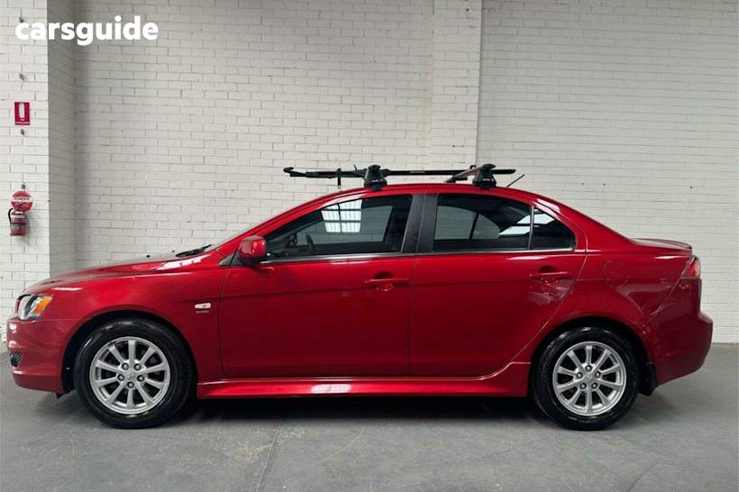 Red 2011 Mitsubishi Lancer Sedan VR