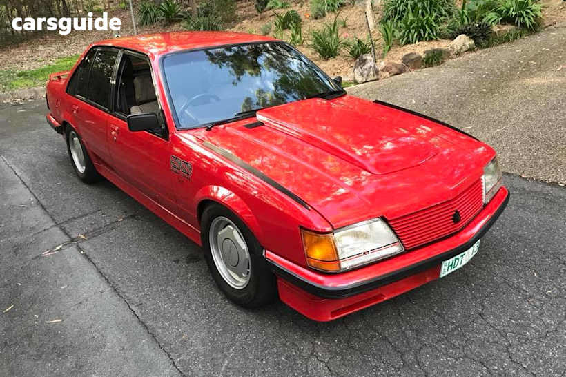 Red 1983 Holden Commodore Sedan