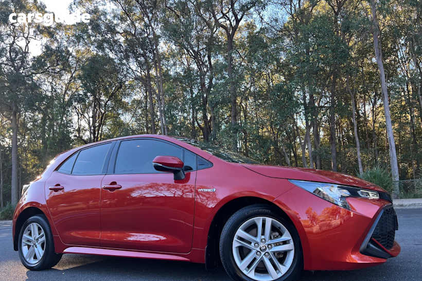 Orange 2019 Toyota Corolla Hatchback Ascent Sport (Hybrid)