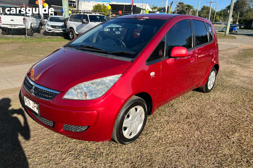 Red 2006 Mitsubishi Colt Hatchback LS