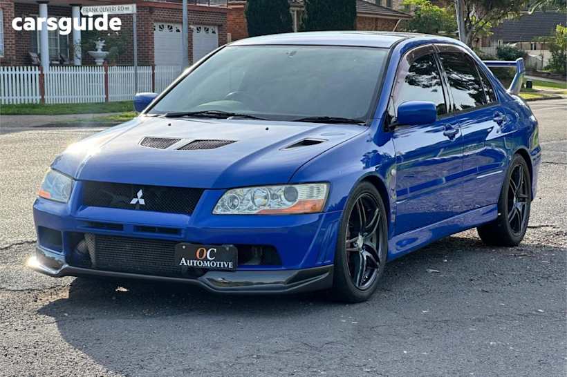 Blue 2001 Mitsubishi Lancer Sedan Evolution VII