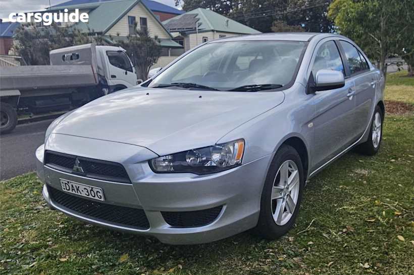 Silver 2014 Mitsubishi Lancer Sedan ES