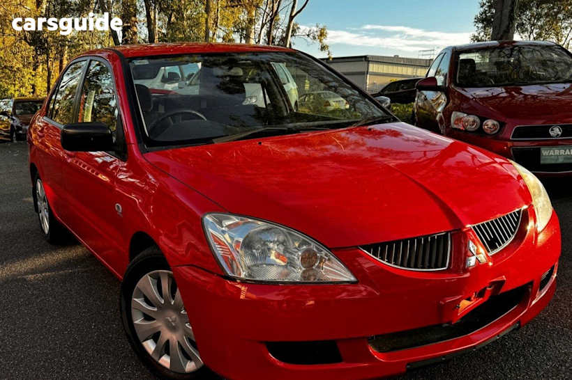 Red 2006 Mitsubishi Lancer Sedan ES