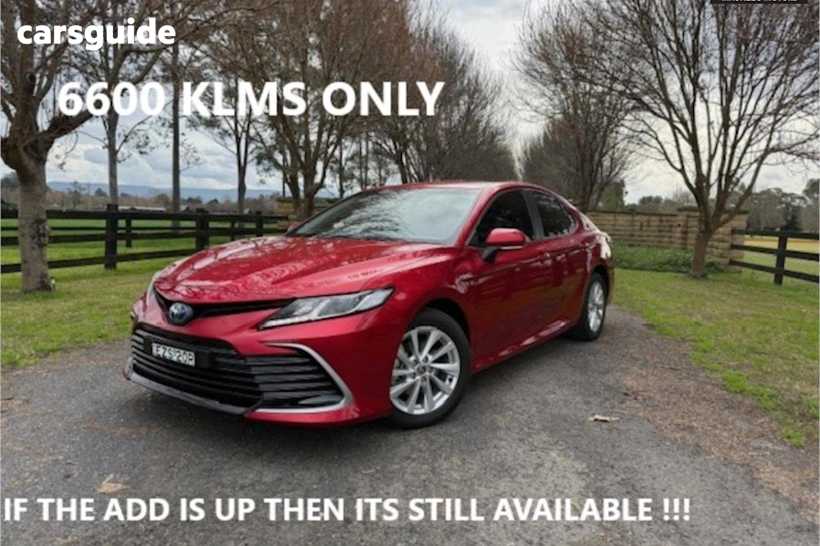 Red 2023 Toyota Camry Sedan Ascent Hybrid