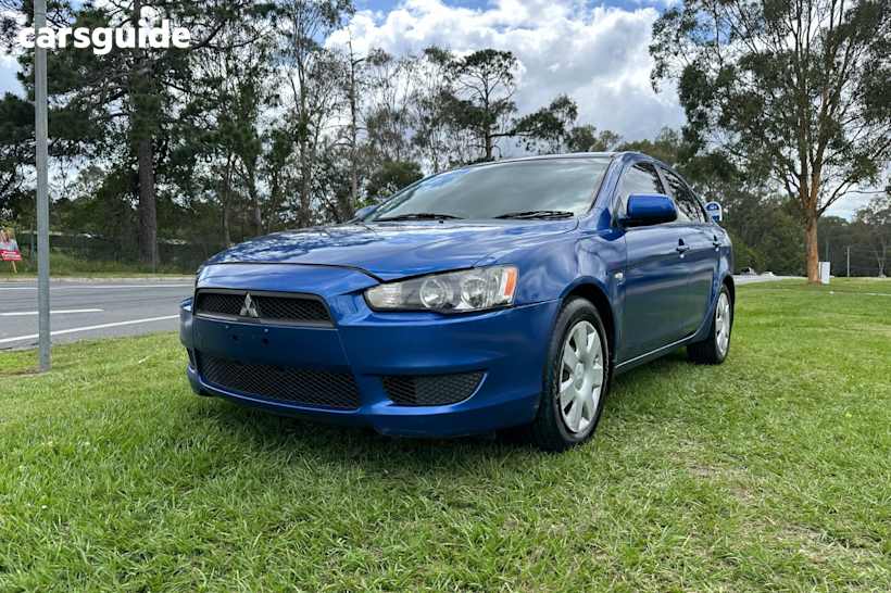 Blue 2011 Mitsubishi Lancer Sedan Sx